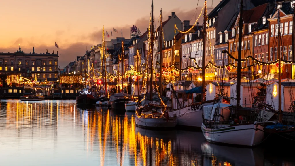 nyhavn canal at sunset, christmas time, nyhavn,copenhagen, denmark, europe istock 1498222113