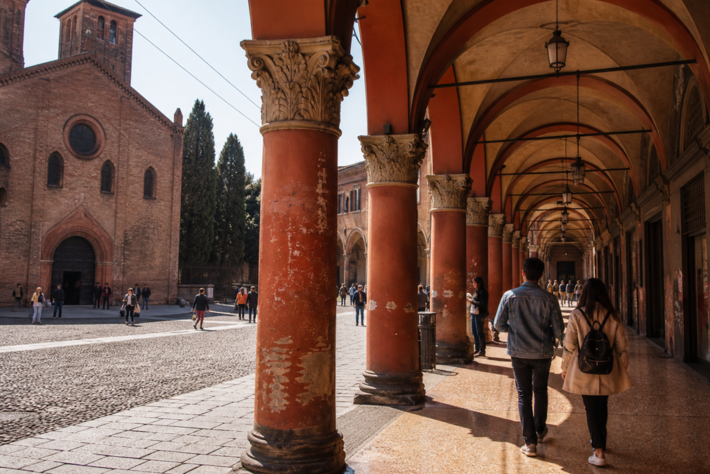 Historic porticoes and pedestrians in Bologna city centre