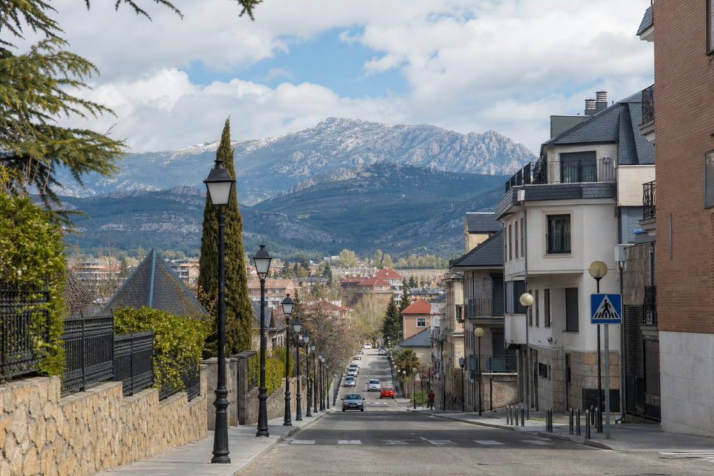 Street and Sierra de Guadarrama landscape in Collado Villalba, Madrid