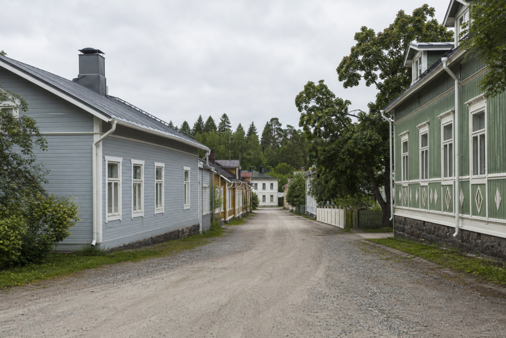 A quiet Finnish town street under an overcast sky