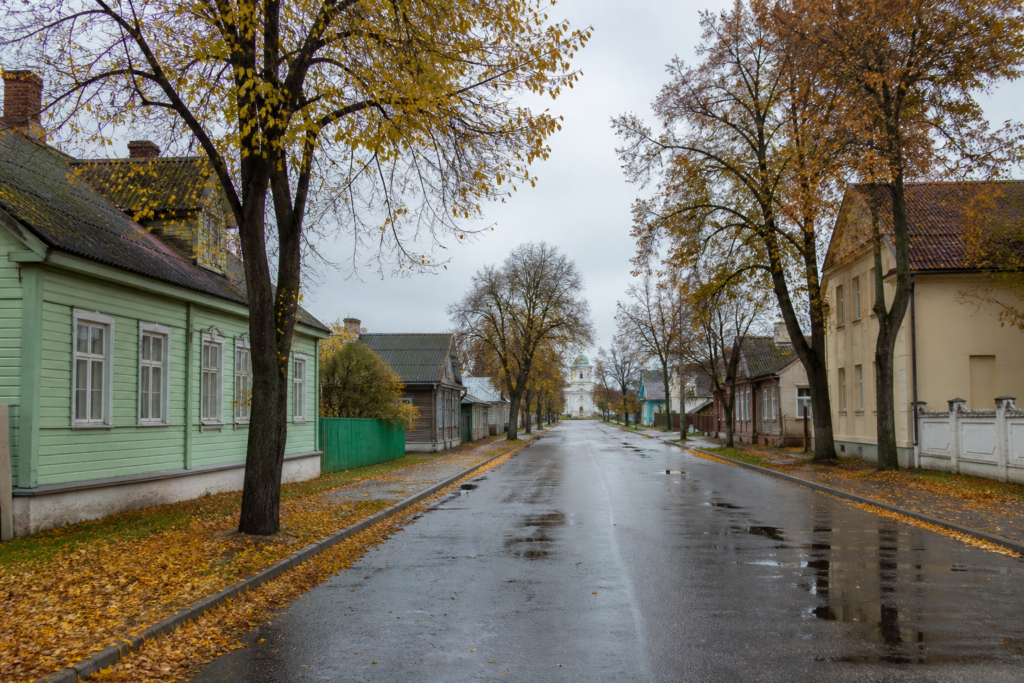 A quiet street in a Belarusian town, illustrating travel guidance about local cannabis laws.